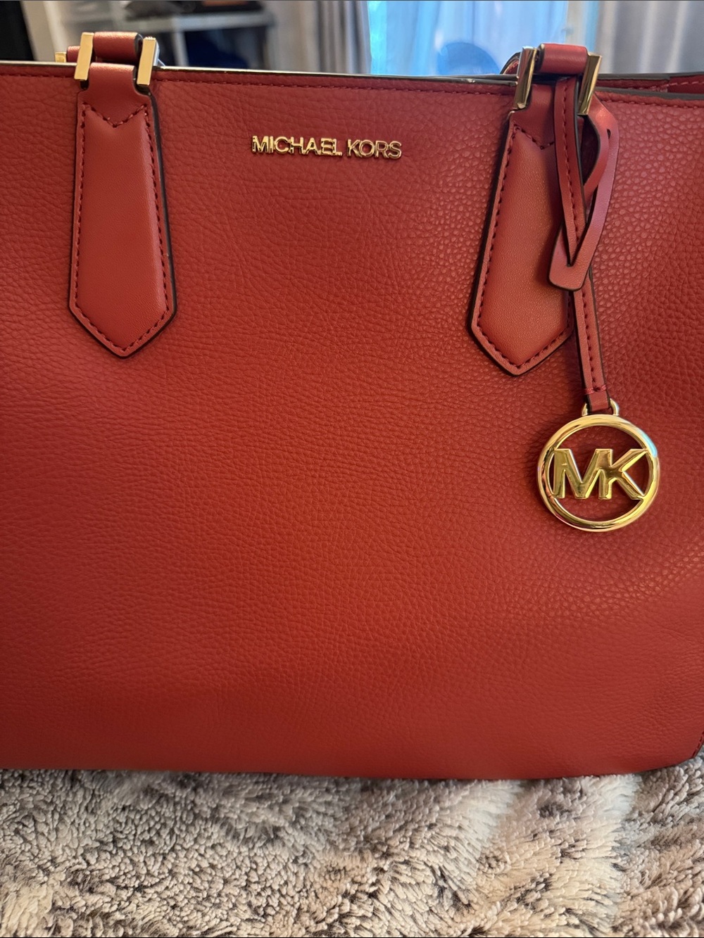 Michael Kors Coral-Red Pebbled Leather Tote with Gold MK Charm